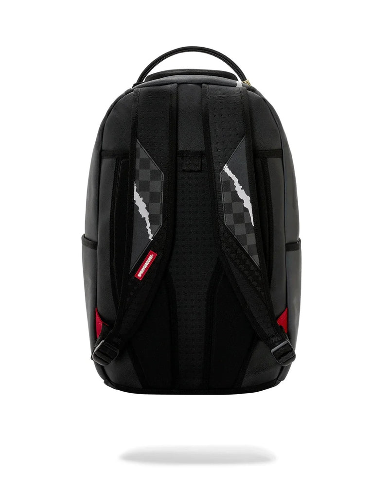 Zaino Sprayground center rip revealing 